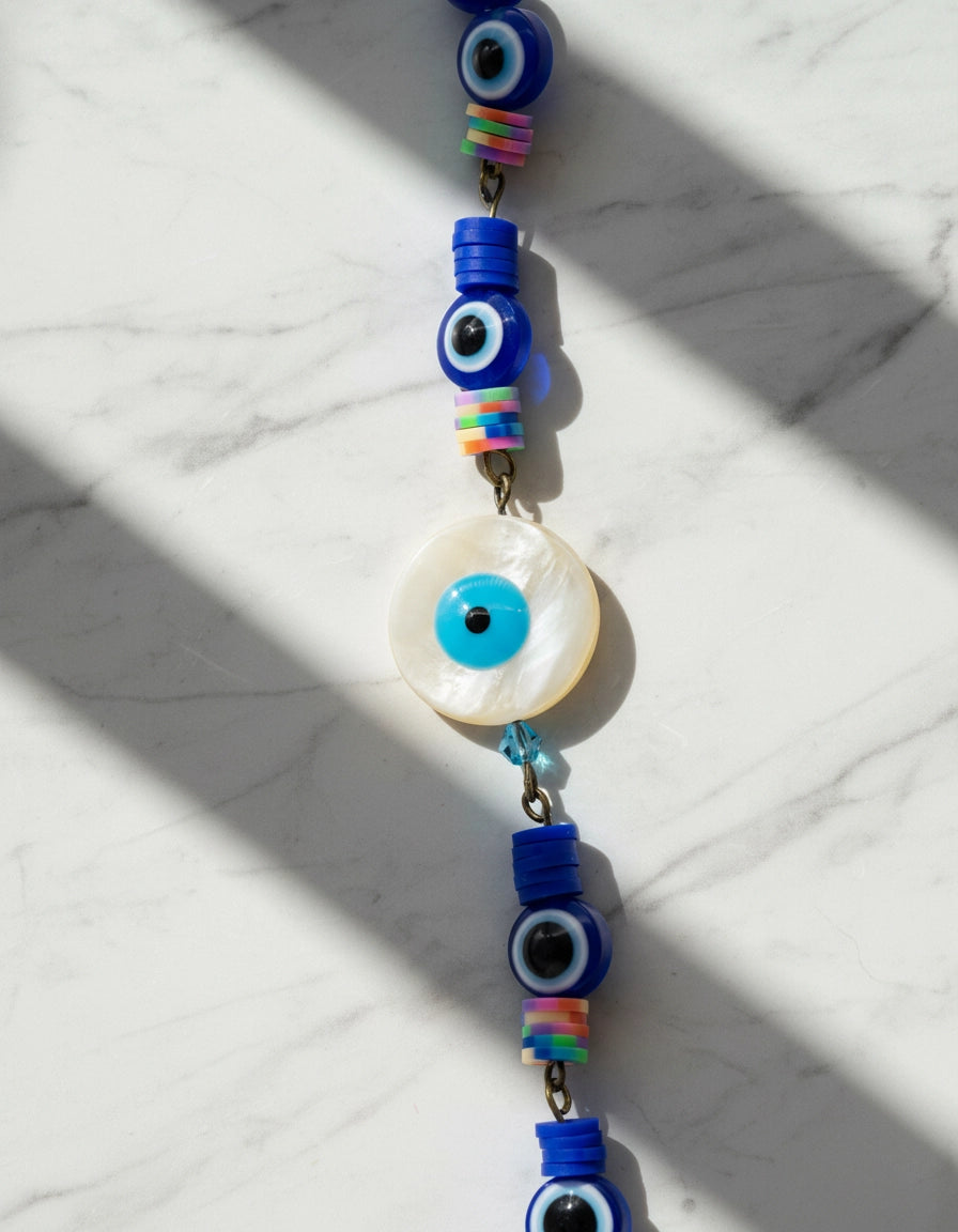 Mystique Luxe: Gold-Silver Eyewear Chain with Evil Eye Charms & Purple Gemstones