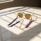 Mystique Luxe: Gold-Silver Eyewear Chain with Evil Eye Charms & Purple Gemstones